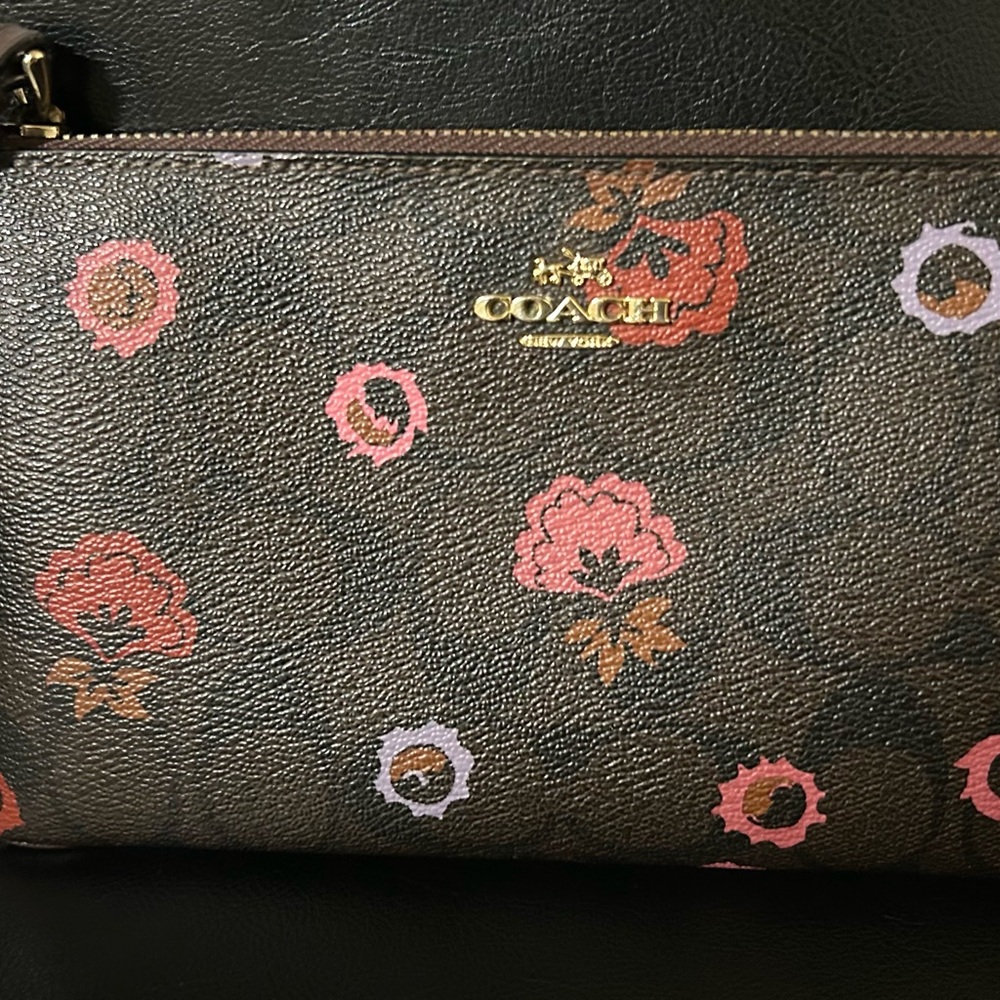 Coach Brown Wristlet with Pink and Red Floral Pattern
